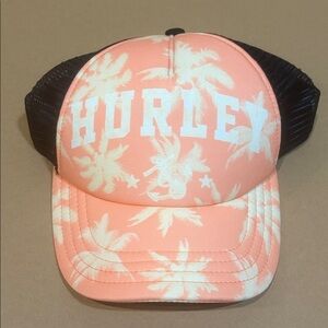 Hurley adjustable snap-back trucker hat in pink with white and black accents